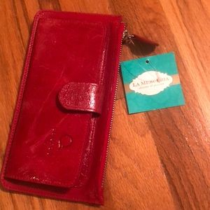 Red leather wallet.